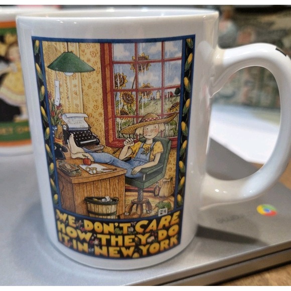 Mary Engelbreit Other - Mary Engelbreit "We‎ Don't Care How They Do It In New York" Fun Ceramic Mug